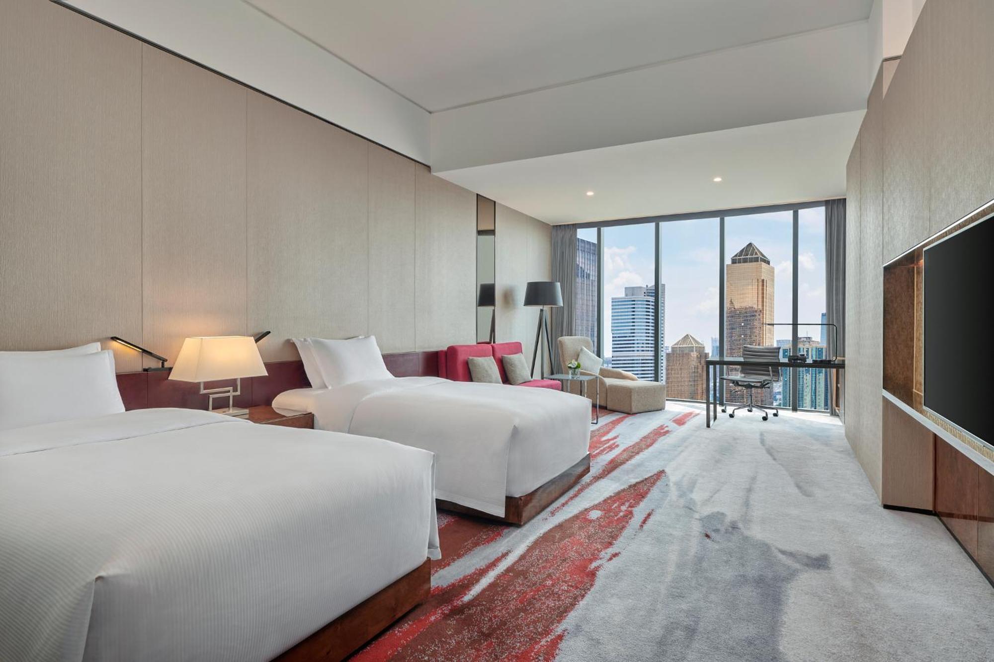 Hilton Guangzhou Tianhe - Free Shuttle Bus And Registration Counter Available During Canton Fair Period Eksteriør bilde Deluxe Room